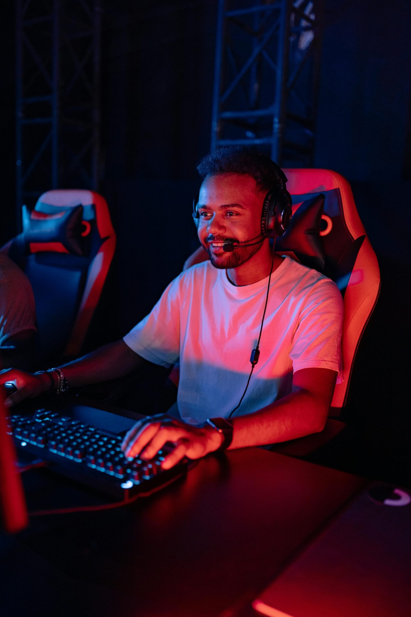 Esports player competing at a gaming station